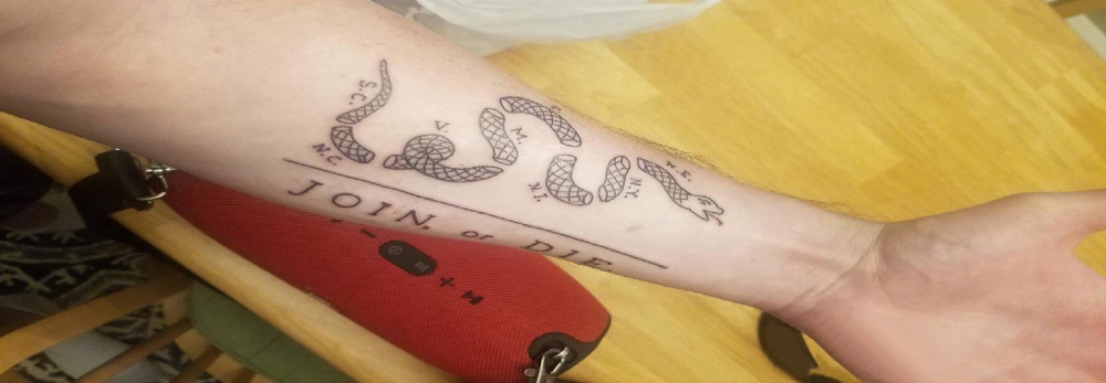 点击大图看下一张：蛇纹身图片 男生手臂上蛇纹身图案