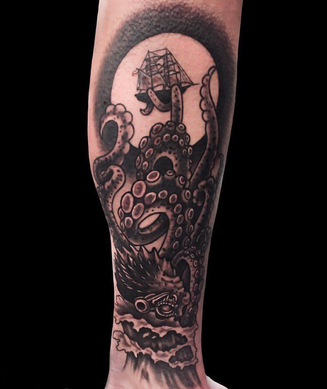 点击大图看下一张：黑色章鱼纹身 男生小腿素描纹身黑色章鱼纹身图片
