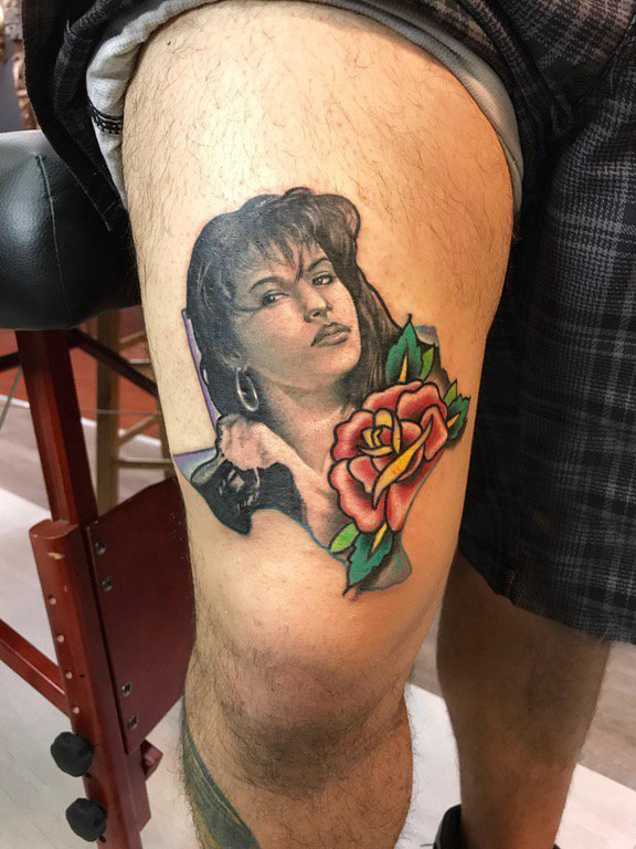 点击大图看下一张：女生人物纹身图案 男生大腿上花朵纹身女生人物纹身图案