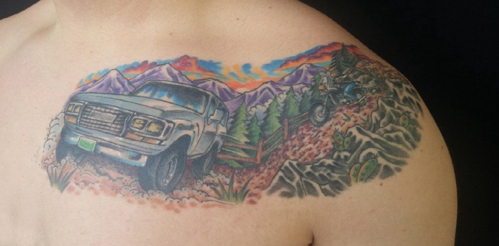 点击大图看下一张：汽车纹身 男生胸部风景和汽车纹身图片