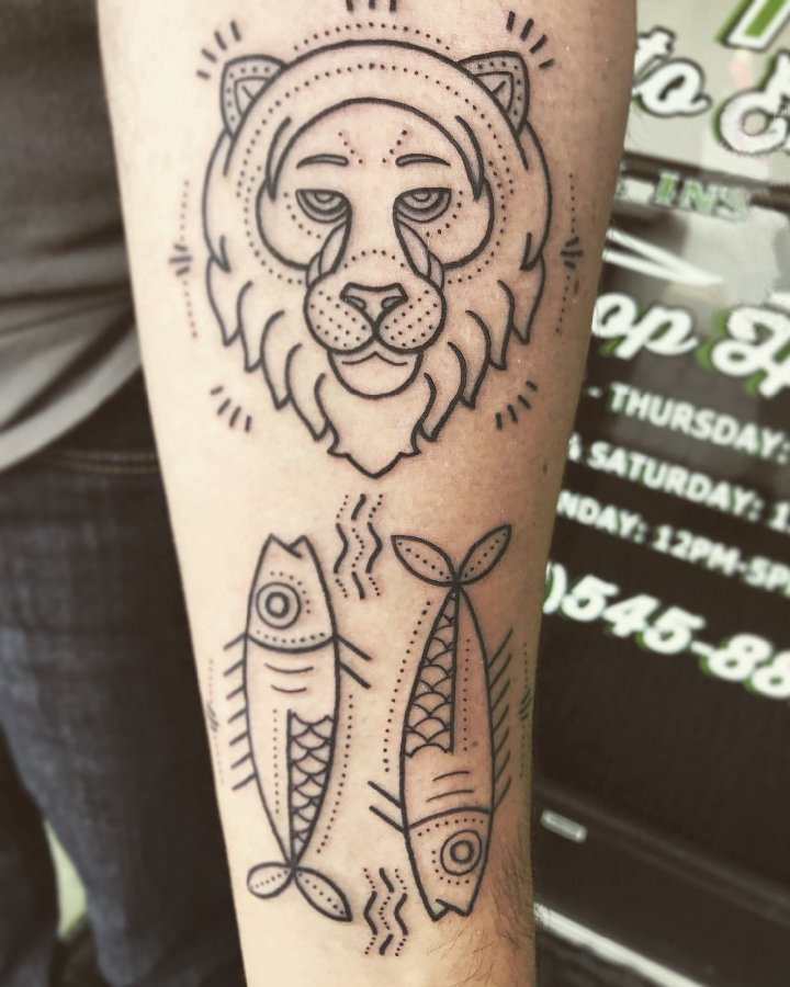 点击大图看下一张：狮子头纹身图片 男生手臂上简单线条纹身狮子头纹身图片
