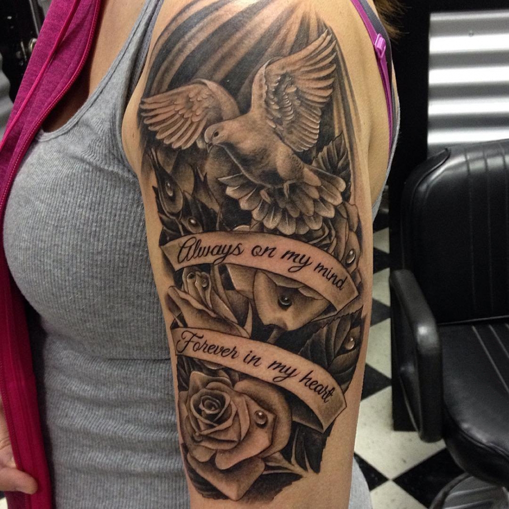 点击大图看下一张：鸽子纹身 女生手臂上鸽子纹身图片