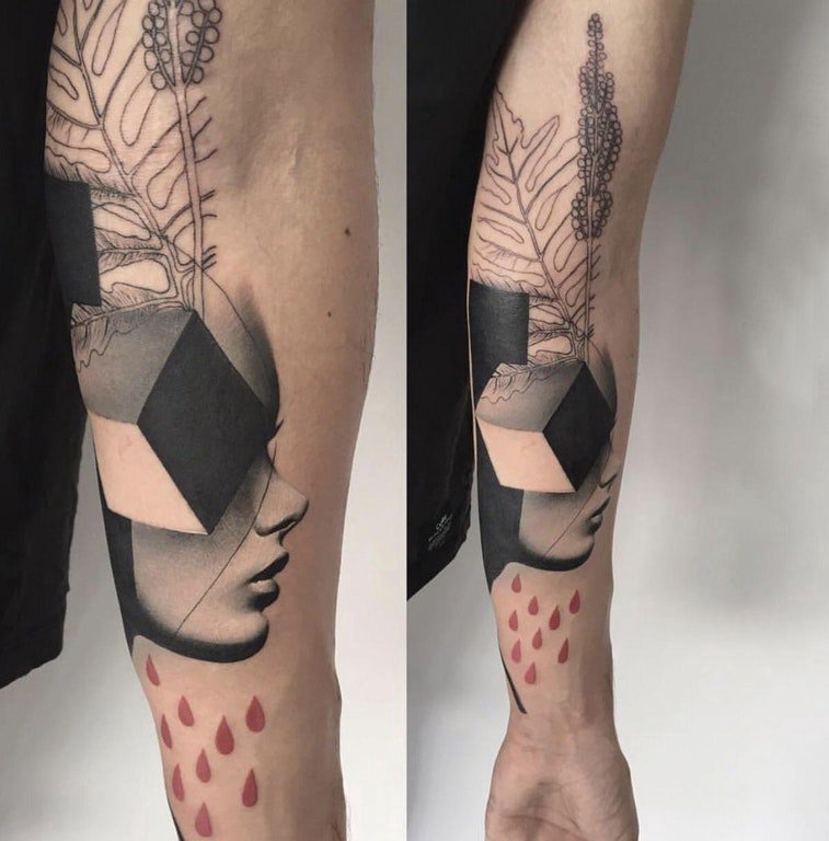 点击大图看下一张：欧美抽象纹身 男生手臂上欧美抽象纹身人物纹身图片