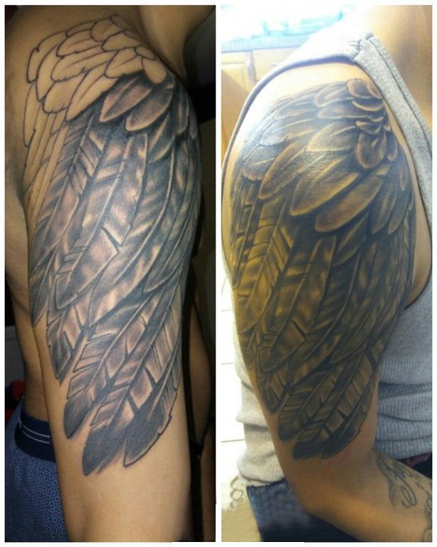 点击大图看下一张：纹身天使翅膀 男生手臂上天使翅膀纹身图片