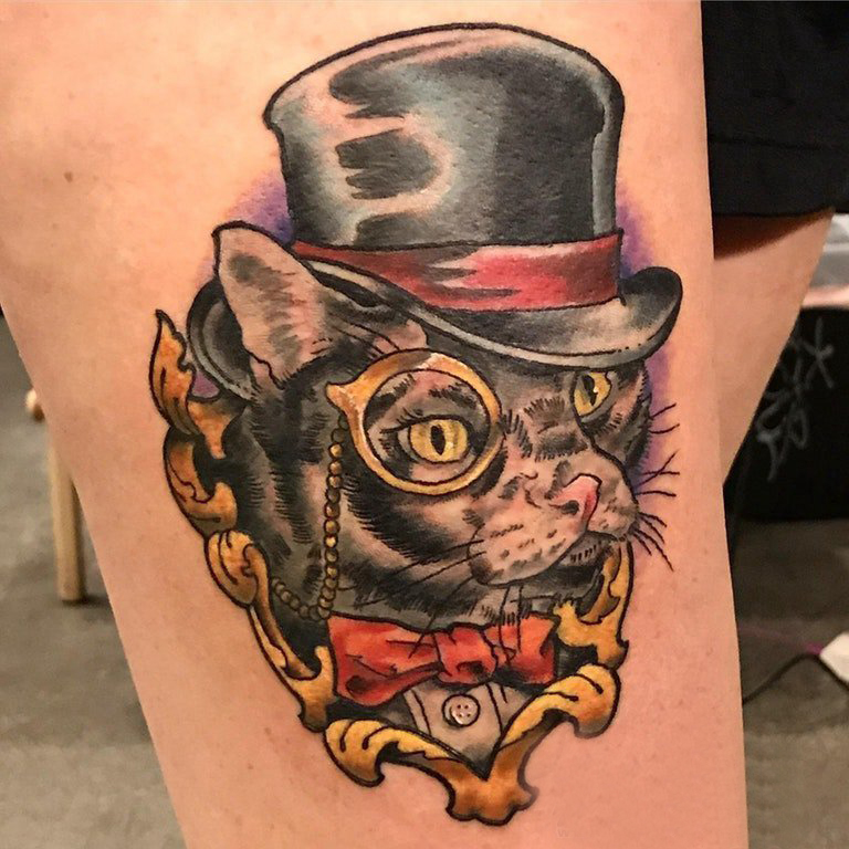 点击大图看下一张：猫咪纹身简单 女生大腿上小猫咪纹身图片