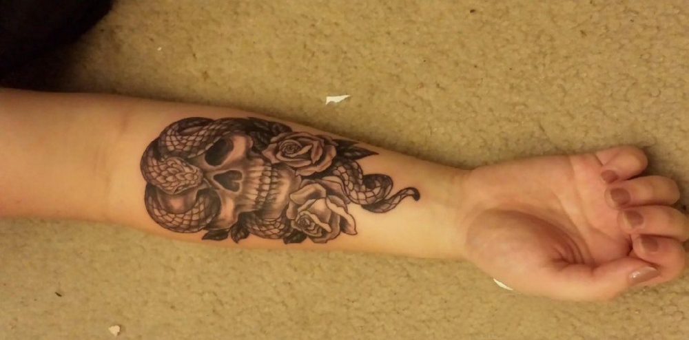 点击大图看下一张：纹身骷髅头 女生手臂上骷髅纹身图片