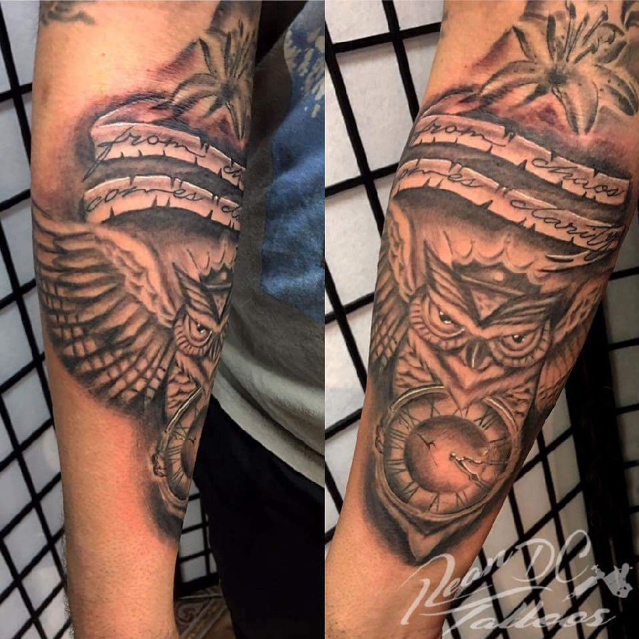 点击大图看下一张：纹身猫头鹰 男生手臂上猫头鹰欧美纹身图片