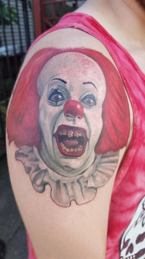 点击大图看下一张：纹身小丑图案 男生手臂上小丑纹身图案