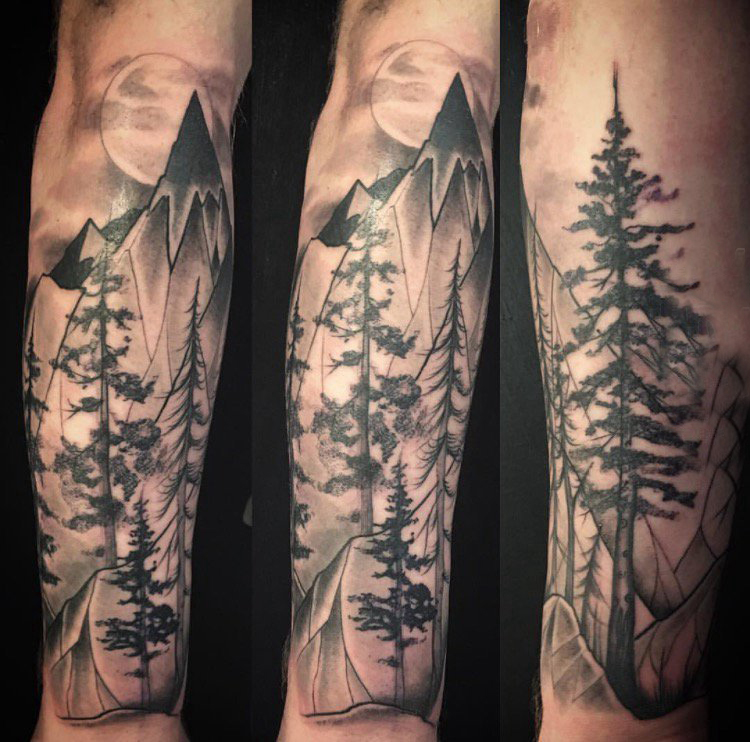 点击大图看下一张：小山峰纹身 男生手臂上树纹身图片