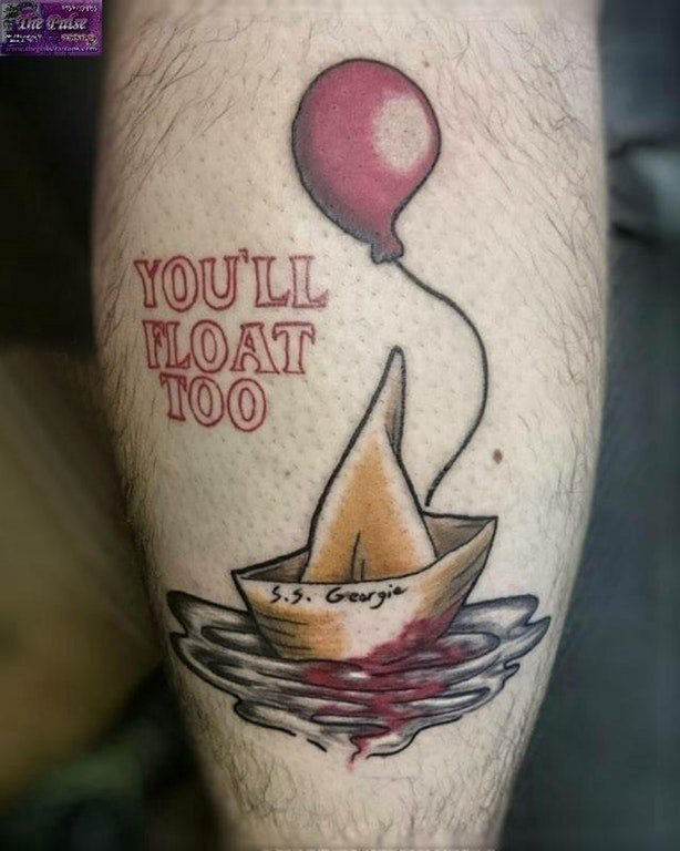 点击大图看下一张：小腿对称纹身 男生小腿上气球和帆船纹身图片