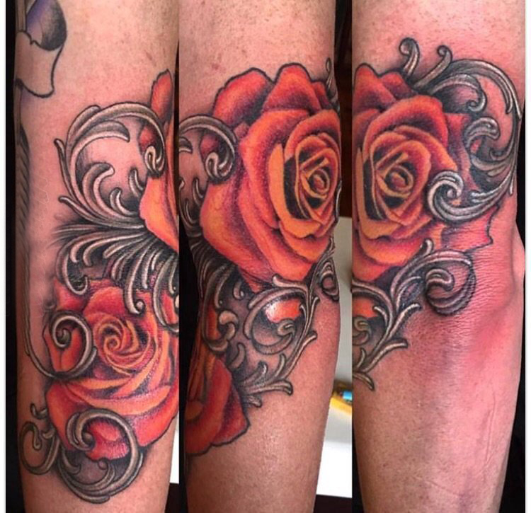 点击大图看下一张：欧美玫瑰纹身 男生手臂上花朵纹身图片