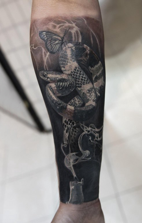 点击大图看下一张：蛇纹身 图腾 男生手臂上蛇纹身图片