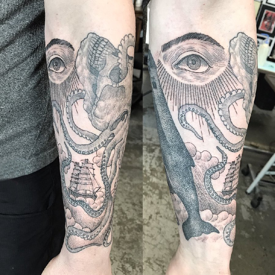 点击大图看下一张：眼睛纹身 男生手臂上黑色章鱼纹身图片