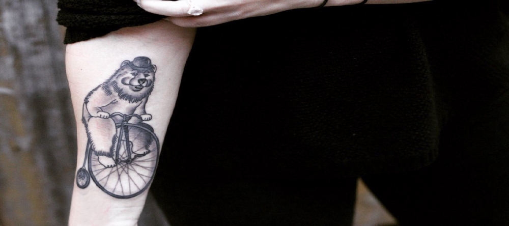 点击大图看下一张：熊纹身 女生手臂上熊纹身图片