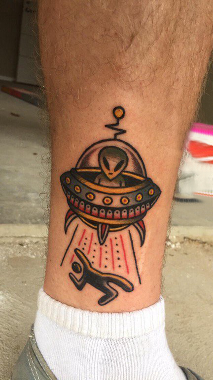 点击大图看下一张：宇宙纹身图案 男生小腿上宇宙纹身图案