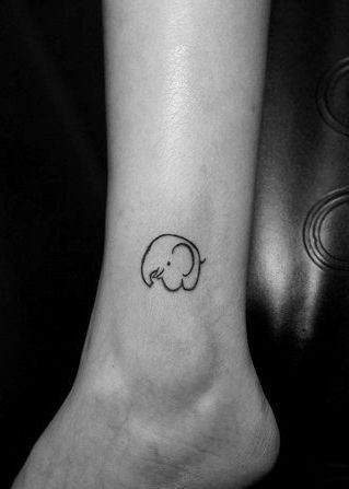 点击大图看下一张：可爱小象腿部纹身