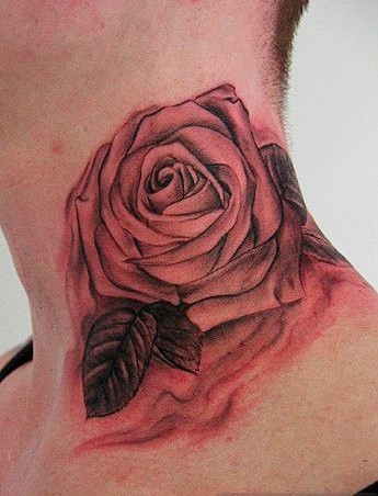 点击大图看下一张：炫彩玫瑰颈部纹身