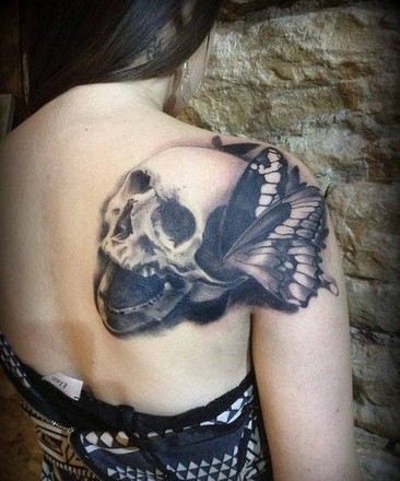 点击大图看下一张：艺术骷髅肩部纹身