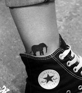 点击大图看下一张：可爱小象腿部纹身