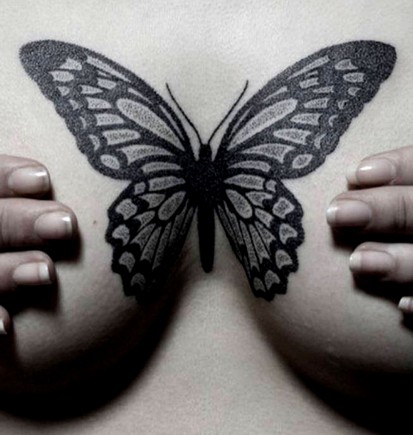 点击大图看下一张：风雅蝴蝶胸部纹身