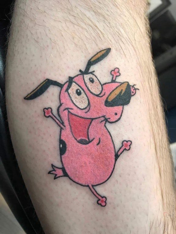 点击大图看下一张：小狗纹身图片 男生小腿上彩色的卡通小狗纹身图片