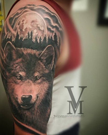 点击大图看下一张：狼纹身 男生手臂上狼头纹身图案