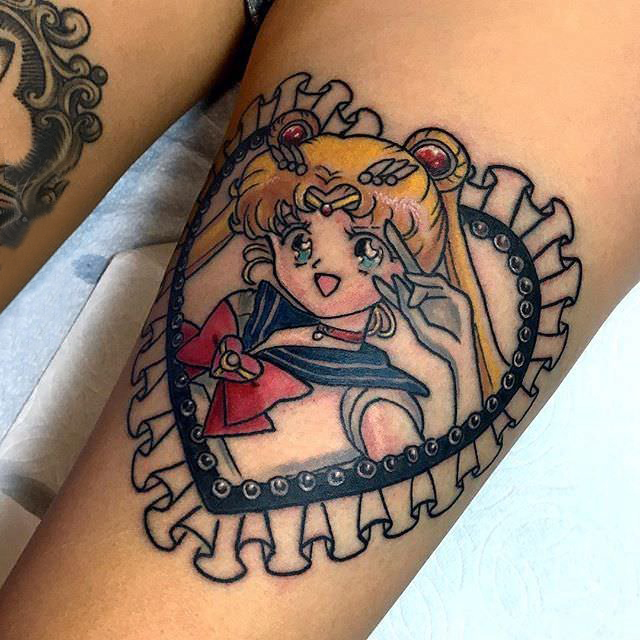 点击大图看下一张：美少女战士纹身图案 女生大腿上心形和美少女战士纹身图片
