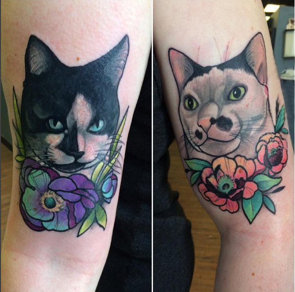 点击大图看下一张：猫咪纹身简单 男生手臂上小猫咪纹身图片