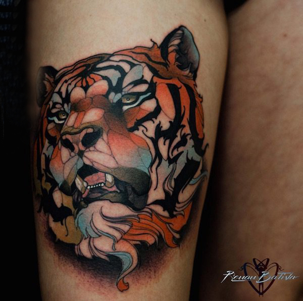 点击大图看下一张：百乐动物纹身 女生大腿上彩色的老虎纹身图片
