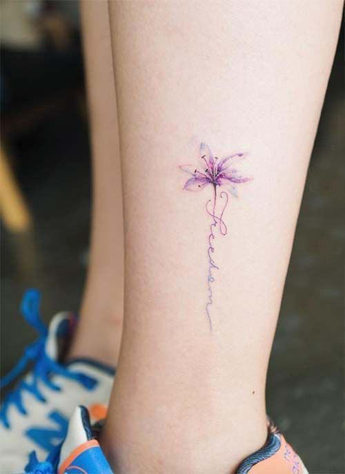 点击大图看下一张：花朵纹身 女生小腿上彩色的花朵纹身图片