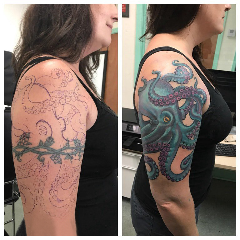 点击大图看下一张：纹身覆盖 女生大臂上彩色的章鱼纹身图片