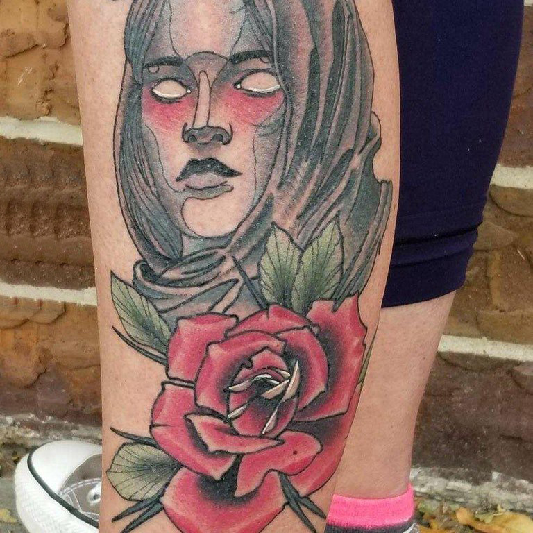 点击大图看下一张：女生人物纹身图案 女生小腿上人物纹身图片