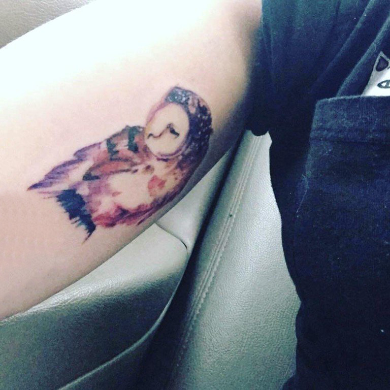 点击大图看下一张：纹身猫头鹰 女生手臂上猫头鹰图腾纹身图片