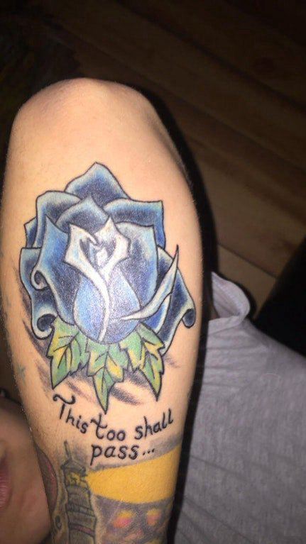 点击大图看下一张：纹身 小玫瑰 男生手臂上欧美玫瑰纹身图片