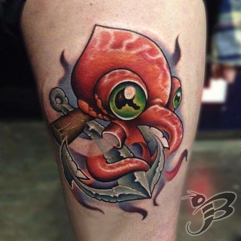点击大图看下一张：纹身卡通 男生小腿上彩色的卡通鱿鱼纹身图片