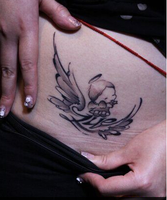 点击大图看下一张：天使精灵腹部纹身