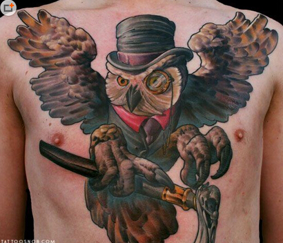点击大图看下一张：暗黑猫头鹰胸部纹身