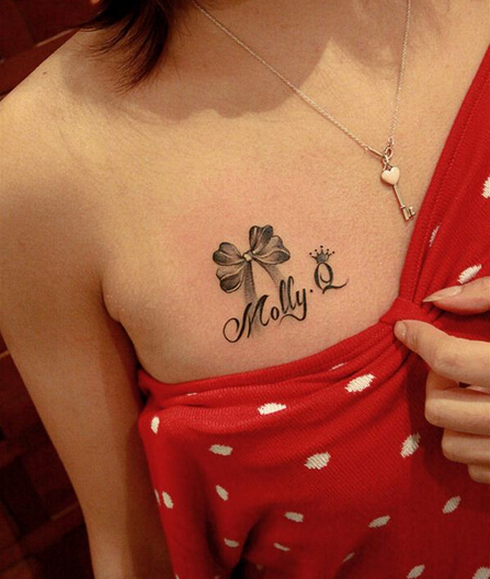 点击大图看下一张：tattoo个性胸部纹身