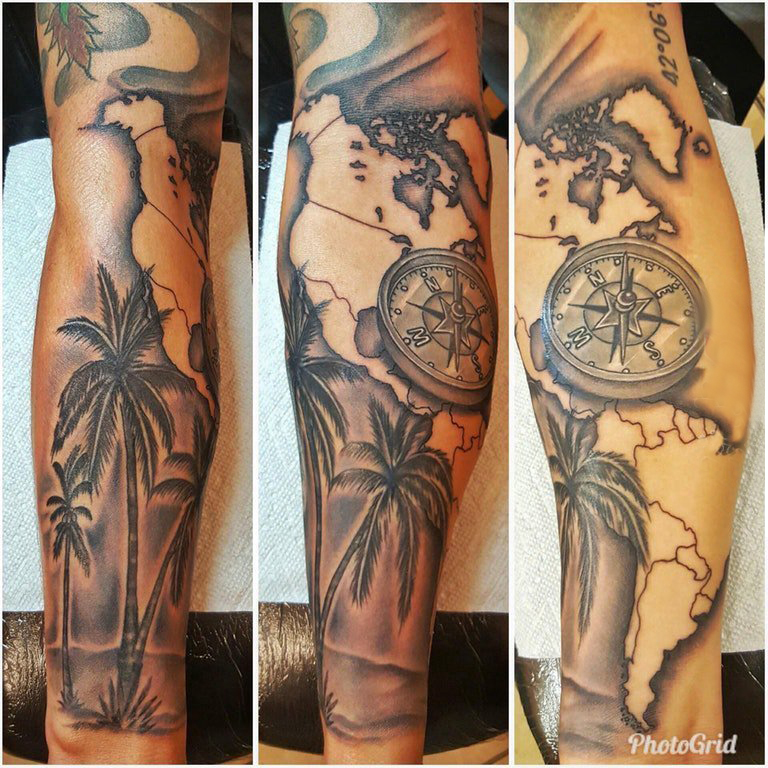 点击大图看下一张：手臂纹身素材 男生手臂上指南针和椰树纹身图片