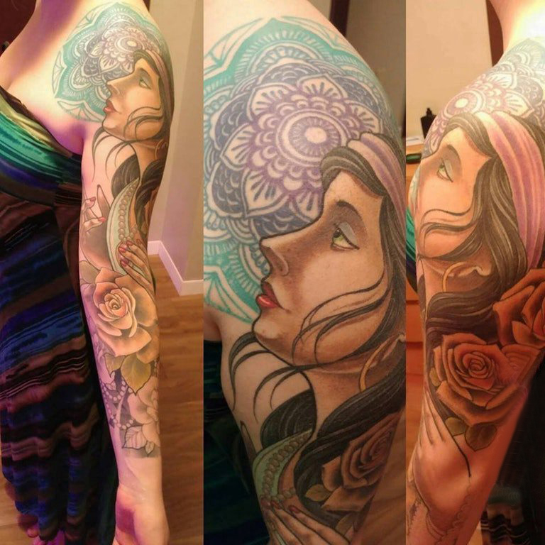 点击大图看下一张：人物纹身图案 女生的手臂上人物纹身图案