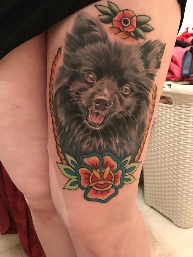 点击大图看下一张：小狗纹身图案 女生大腿上小狗纹身图片