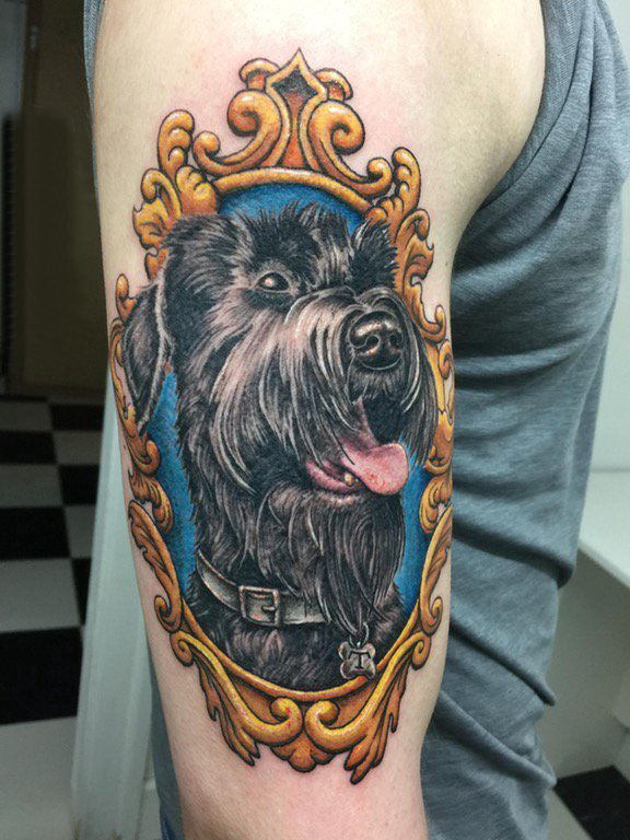 点击大图看下一张：小狗纹身图片 男生手臂上素描纹身小狗纹身图片