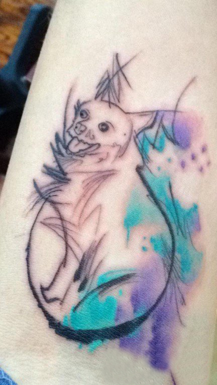 点击大图看下一张：小狗纹身图片 女生大腿上小狗纹身图片