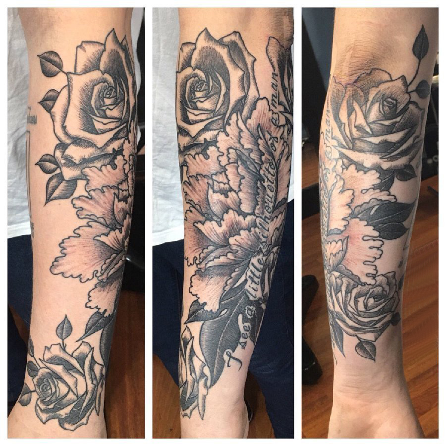点击大图看下一张：文艺花朵纹身 女生手臂上玫瑰纹身图片