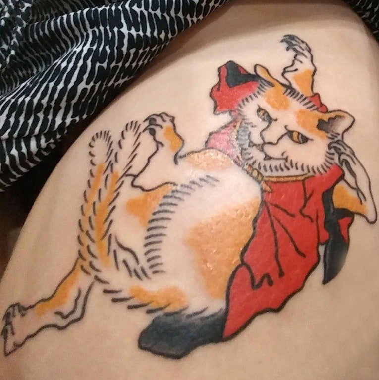 点击大图看下一张：猫纹身 女生大腿上小猫咪纹身图片
