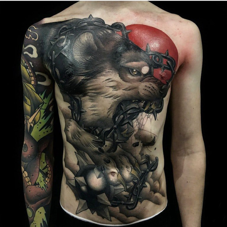 点击大图看下一张：百乐动物纹身 男生胸部百乐动物纹身图片