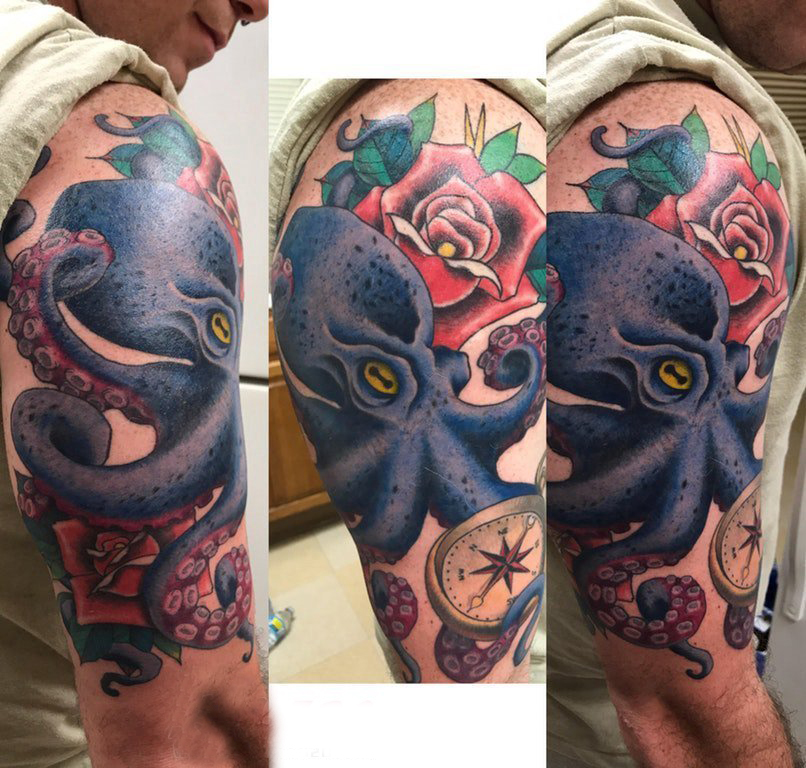 点击大图看下一张：大臂纹身图片 男生大臂上玫瑰和章鱼纹身图片