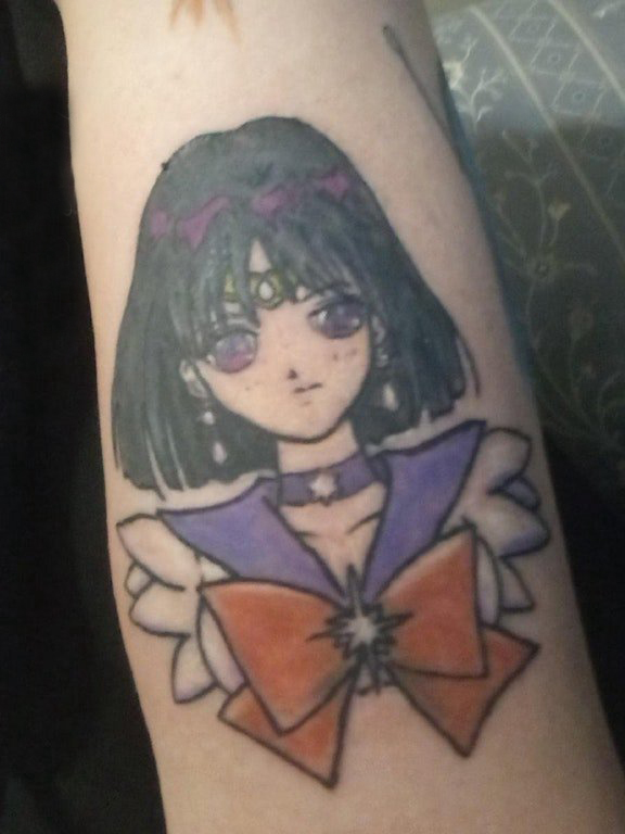 点击大图看下一张：少女纹身  女生手臂上彩色的美少女纹身图片