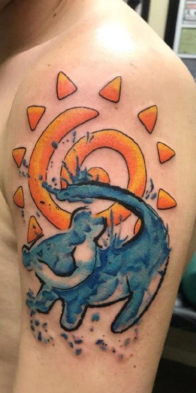点击大图看下一张：纹身卡通  男生大臂上彩色的卡通纹身图片