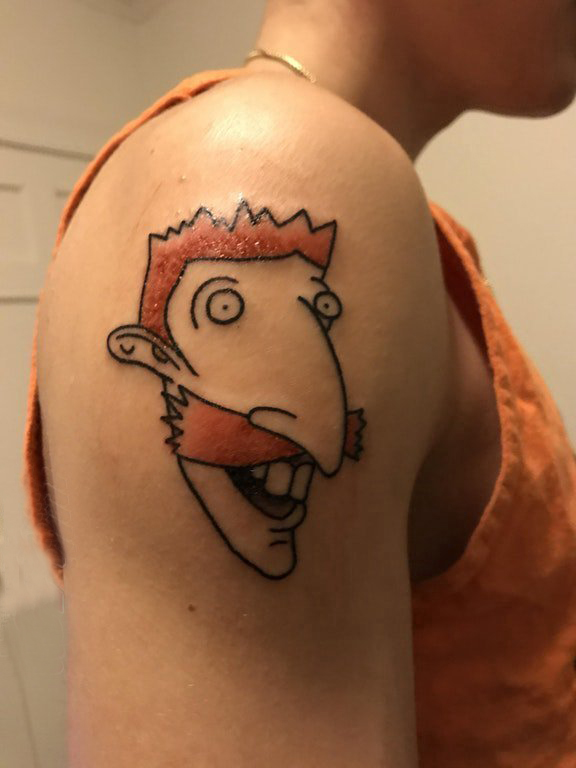 点击大图看下一张：纹身卡通人物 男生大臂上有趣的卡通人物纹身图片